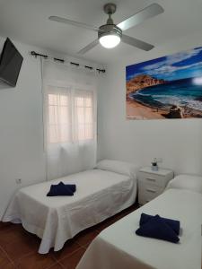 Ένα ή περισσότερα κρεβάτια σε δωμάτιο στο Apartamento El Humedal Cabo de Gata