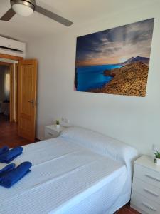 เตียงในห้องที่ Apartamento El Humedal Cabo de Gata