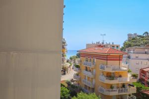 a view from the balcony of a building at "L'Idyllique" Parking, Piscine, Plage, Calme assuré, Gare in Roquebrune-Cap-Martin