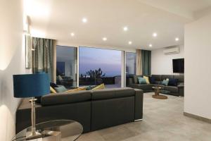 Khu vực ghế ngồi tại Luxury Los Mojones Villa Stunning Seaviews Large Terraces & Private Pool Villa Tendereteros Puerto Del Carmen