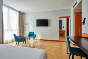 A television and/or entertainment centre at Silken Sant Gervasi