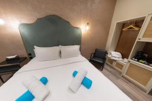 DOMS Boutique Living客房内的一张或多张床位