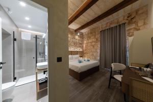 DOMS Boutique Living客房内的一张或多张床位