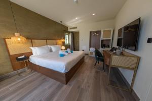 DOMS Boutique Living客房内的一张或多张床位