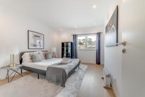 Postel nebo postele na pokoji v ubytování Cruzeiro Deluxe Apartments