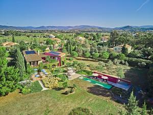 an aerial view of a house with a swimming pool at VILLA MERCEDES 300 m de la plage in La Londe-les-Maures