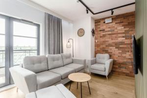 Posedenie v ubytovaní Rent like home - Dwie Motławy III z parkingiem