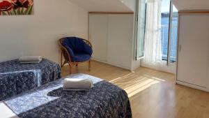 Postel nebo postele na pokoji v ubytování Apartments Rosa