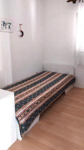 Postel nebo postele na pokoji v ubytování Apartments Rosa