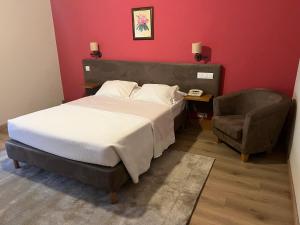 Uma cama ou camas num quarto em Hotel Ribadouro