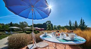 Градина пред VILLA MERCEDES 300 m de la plage