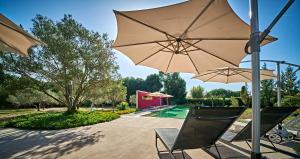 Градина пред VILLA MERCEDES 300 m de la plage