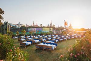 a large group of tables with blue and white tablesearcher at Kremlin Palace in Lara