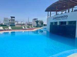Duplex 1 Fila Vista Bahía Paracas - Sotavento 501 T3内部或周边的泳池
