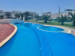 Duplex 1 Fila Vista Bahía Paracas - Sotavento 501 T3内部或周边的泳池