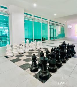 a chess board on the floor of a building at Ipoh D Festivo Suites 6-10pax 10mins to Sunway Tambun by IWH in Ipoh