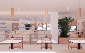 a rendering of a restaurant with tables and chairs at Copaiba by Honne Hotels in Playa de Palma