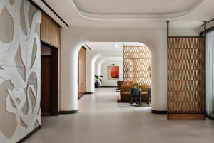 Posezení v ubytování Kimpton Theta New York - Times Square by IHG
