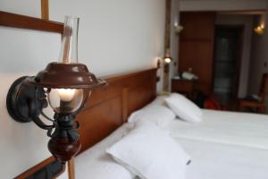 Posteľ alebo postele v izbe v ubytovaní Hotel Pazos Alba