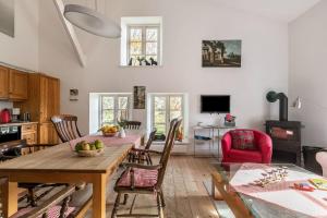 TV a/nebo společenská místnost v ubytování Mühlenhof Ferienwohnung 3a
