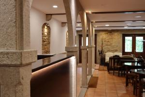 Reštaurácia alebo iné gastronomické zariadenie v ubytovaní Hotel Pazos Alba