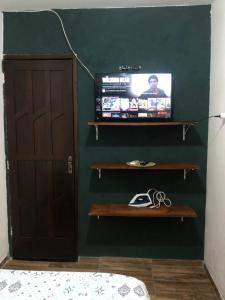 Télévision ou salle de divertissement dans l'établissement Suíte, Bem localizado em Morro de São Paulo Ba