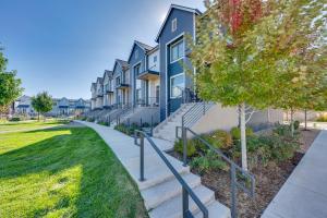 a row of houses with stairs in a park at Modern Townhome, Day Trip to Colorado Ski Resorts! in Louisville