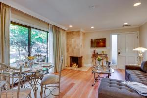 a living room with a table and a couch at Serene Napa Retreat with Pool Access and Patio! in Napa