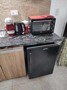 Kuchyň nebo kuchyňský kout v ubytování María Montaña - Departamento en San Juan