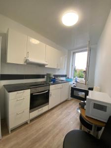 Kuchyň nebo kuchyňský kout v ubytování Annie´s Appartements