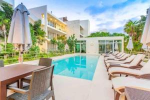 Bazén v ubytování ¡Your oasis by the beach! Loft in Santamar nebo v jeho okolí