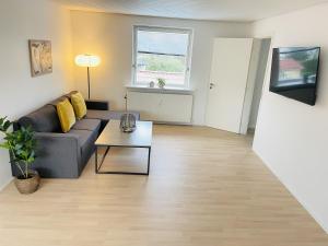 Posezení v ubytování aday - Modern 3 bedrooms apartment in Svenstrup + 14 fotografií