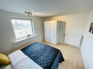 Postel nebo postele na pokoji v ubytování aday - Modern 3 bedrooms apartment in Svenstrup