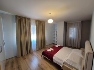 Postel nebo postele na pokoji v ubytování Haris Hotel