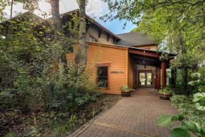 a house with a brick walkway in front of it at Condo - Dreamcatcher 121 in Driggs