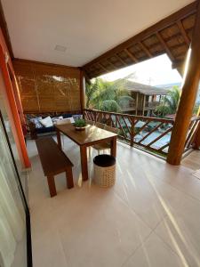 Ban công/sân hiên tại VILLAGE HOUSE ITACIMIRIM