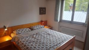 Postel nebo postele na pokoji v ubytování Floralp #5 - gemütlich mit Aussicht