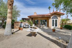 a house with a fountain in front of it at Pet-Friendly Borrego Springs Retreat in Borrego Springs