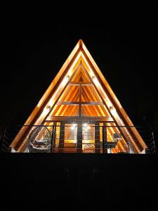a pyramid shaped building with lights on top of it at Zlatar Resort & SPA in Nova Varoš