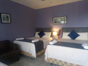 Voodi või voodid majutusasutuse Hotel Vista del Mar toas