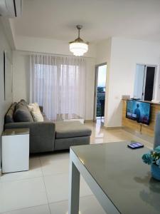 אזור ישיבה ב-Elegant and confortable close to Boca Chica Beach