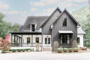 a house with a black and white exterior at Stunning Estate in Leipers Fork with Pool, Hot Tub, Sauna in Franklin