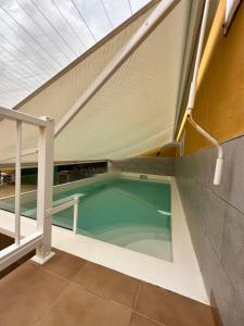 an indoor swimming pool in a building at Casa Fagajesto in Las Palmas de Gran Canaria