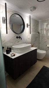 Ένα μπάνιο στο K&M 40 Ekklision A’