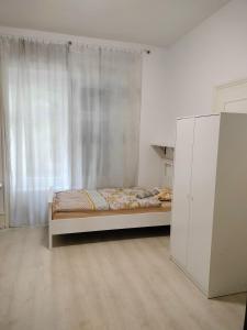 a bedroom with a bed and a window at City Home Zurich in Zurich +19 photos