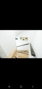 a room with white walls and a white floor and a table at 3 FLOOR OLD CITY 1 in Istanbul +12 photos