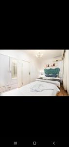 Ένα ή περισσότερα κρεβάτια σε δωμάτιο στο 3 FLOOR OLD CITY 1