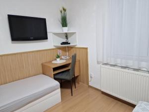 Posteľ alebo postele v izbe v ubytovaní Penzion Lea
