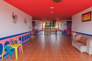 Зона вітальні в Hotel Arrayanes del Quindío