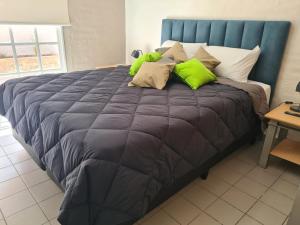 Llit o llits en una habitació de Avellaneda Apart 3